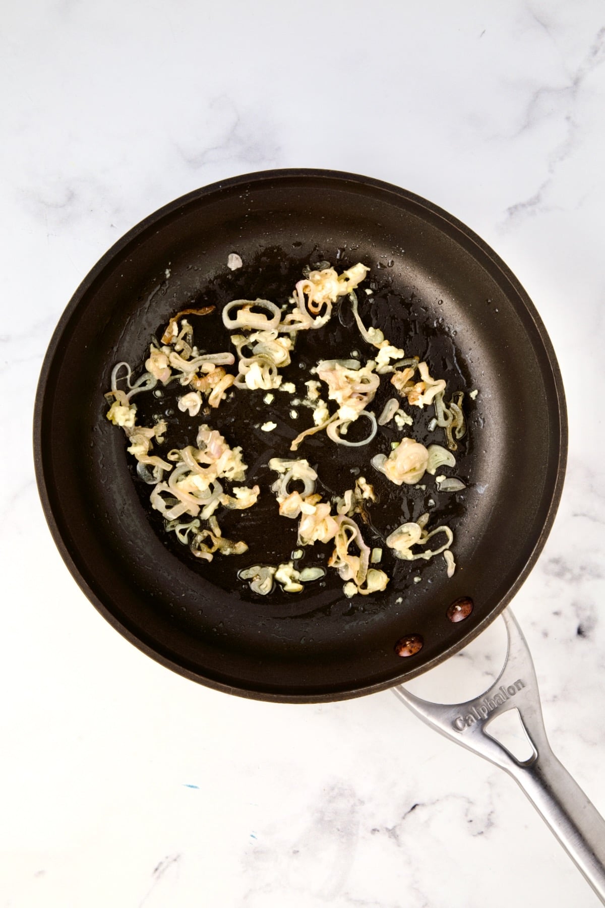 Softened sliced shallot and garlic in nonstick skillet.
