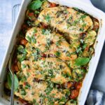 One-Pan Italian Chicken and Vegetables in white rectangular baking dish.