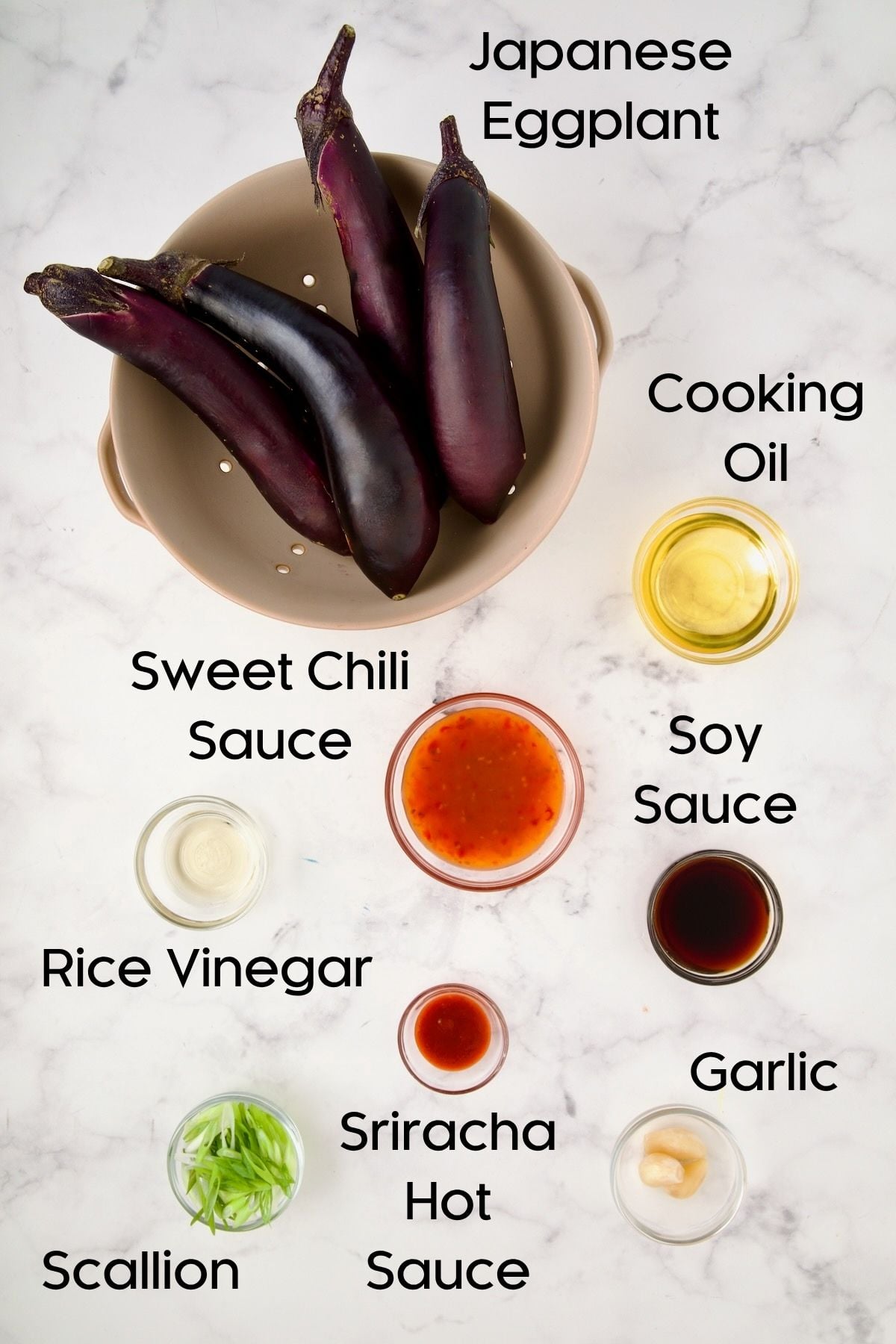 Ingredients for Thai Sweet Chili Eggplant in glass bowls.
