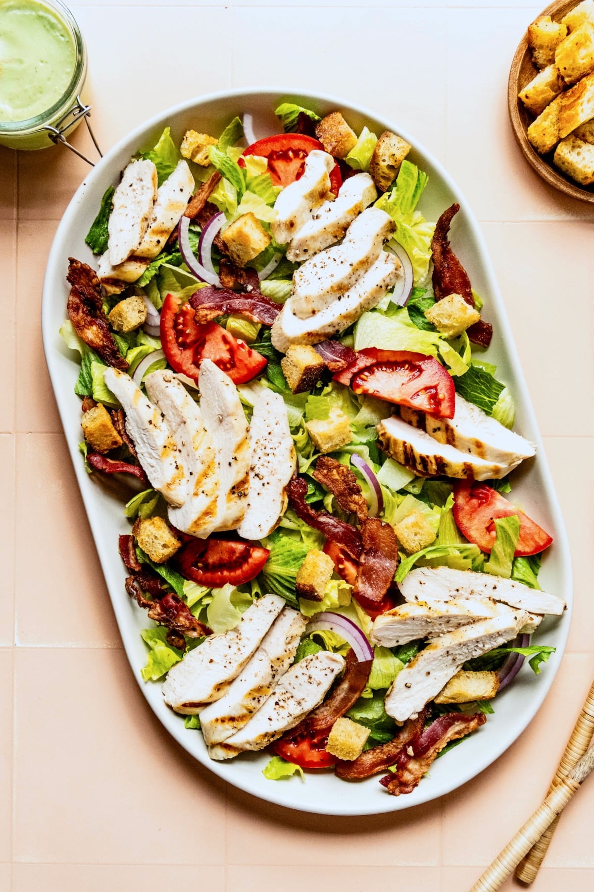 Chicken BLT Salad on white platter.