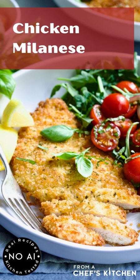 Pinterest graphic for Chicken Milanese showing it in a white dinner bowl garnished with fresh basil leaves.