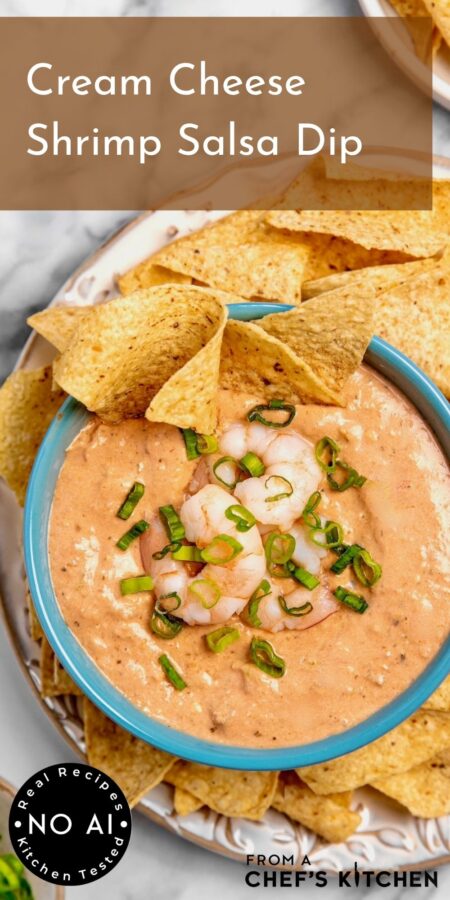 Pinterest graphic for Cream Cheese Shrimp Salsa Dip showing it in bright blue bowl surrounded by tortilla chips.
