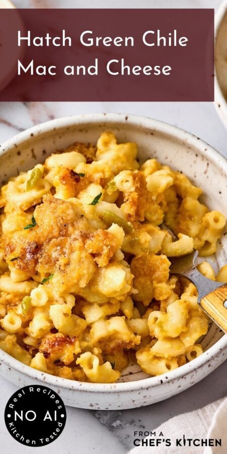 Pinterest graphic for Hatch Green Chile Mac and Cheese showing one serving in a white speckled bowl.
