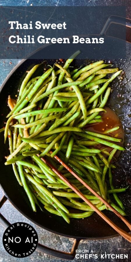Pinterest graphic for Thai Sweet Chili Green Beans showing it in a wok with wooden tongs.